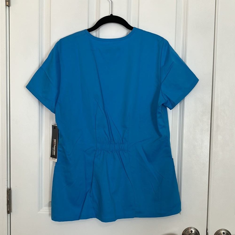 Grey’s Anatomy 2 Pocket Mock Wrap Top - Picture 5 of 5